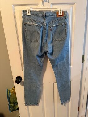 Levi Jeans with Raw Hem and Button Fly Jeans Size 28 Women’s